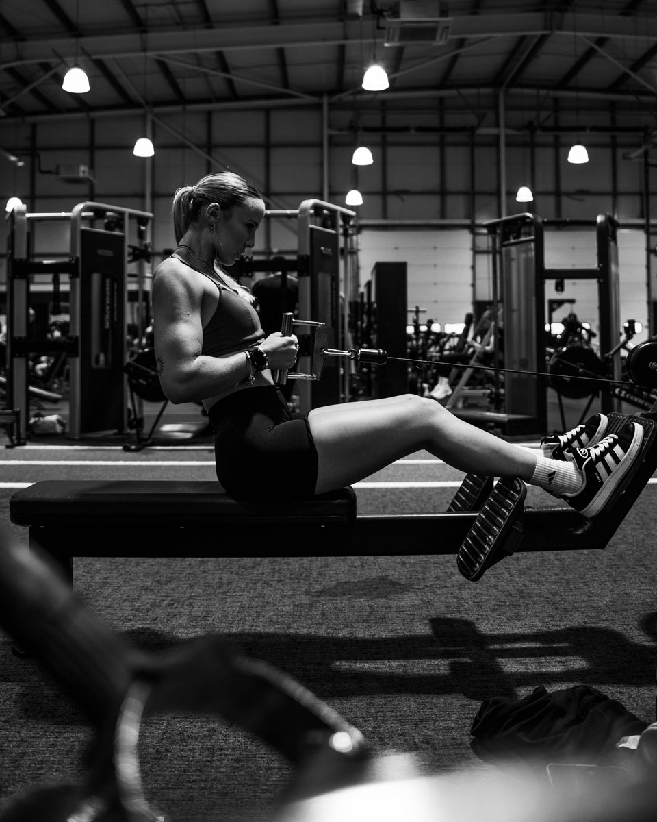 The coach is working out at the gym.